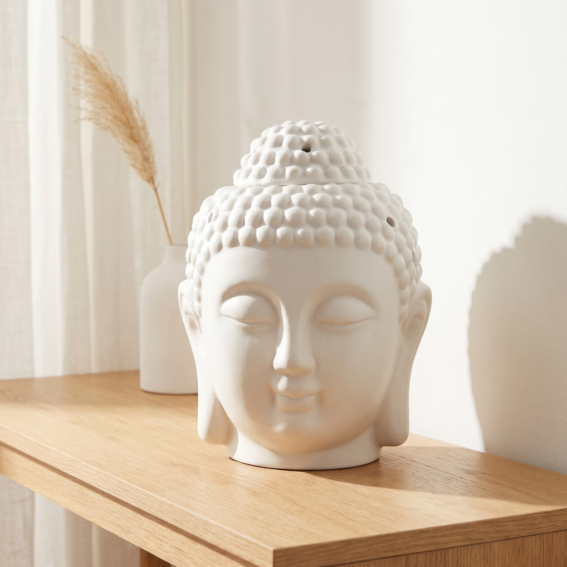 Quemador de cera de ceramica con forma de cabeza de buddha blanco